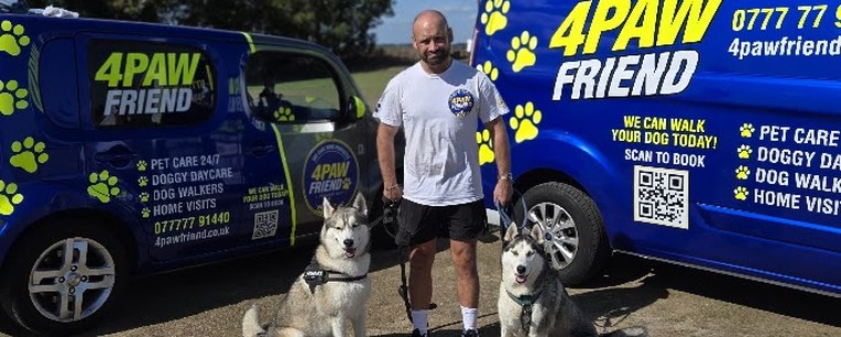 The branded 4 Paw Friend vans used for collection and drop-off.